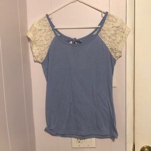 Delia’s periwinkle shirt with lace sleeves